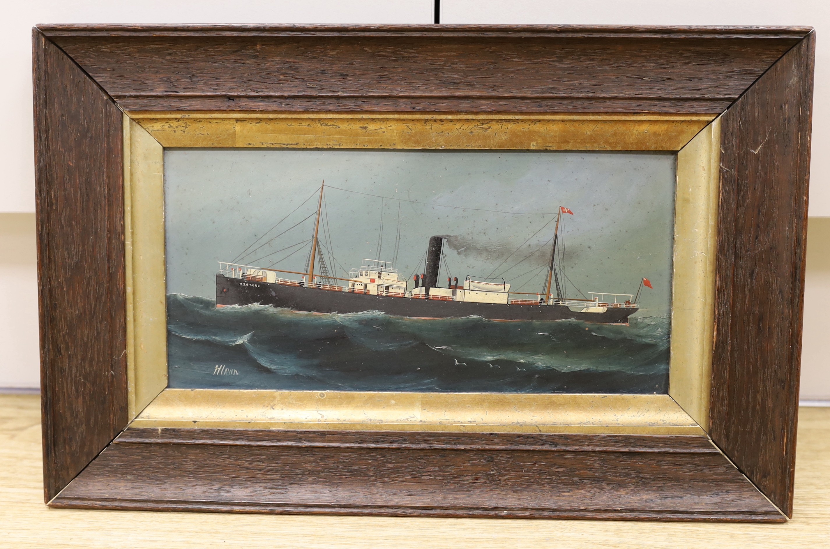 English School c.1900, oil on board, Portrait of the steamship Ashmore, indistinctly signed, 14 x 30cm
